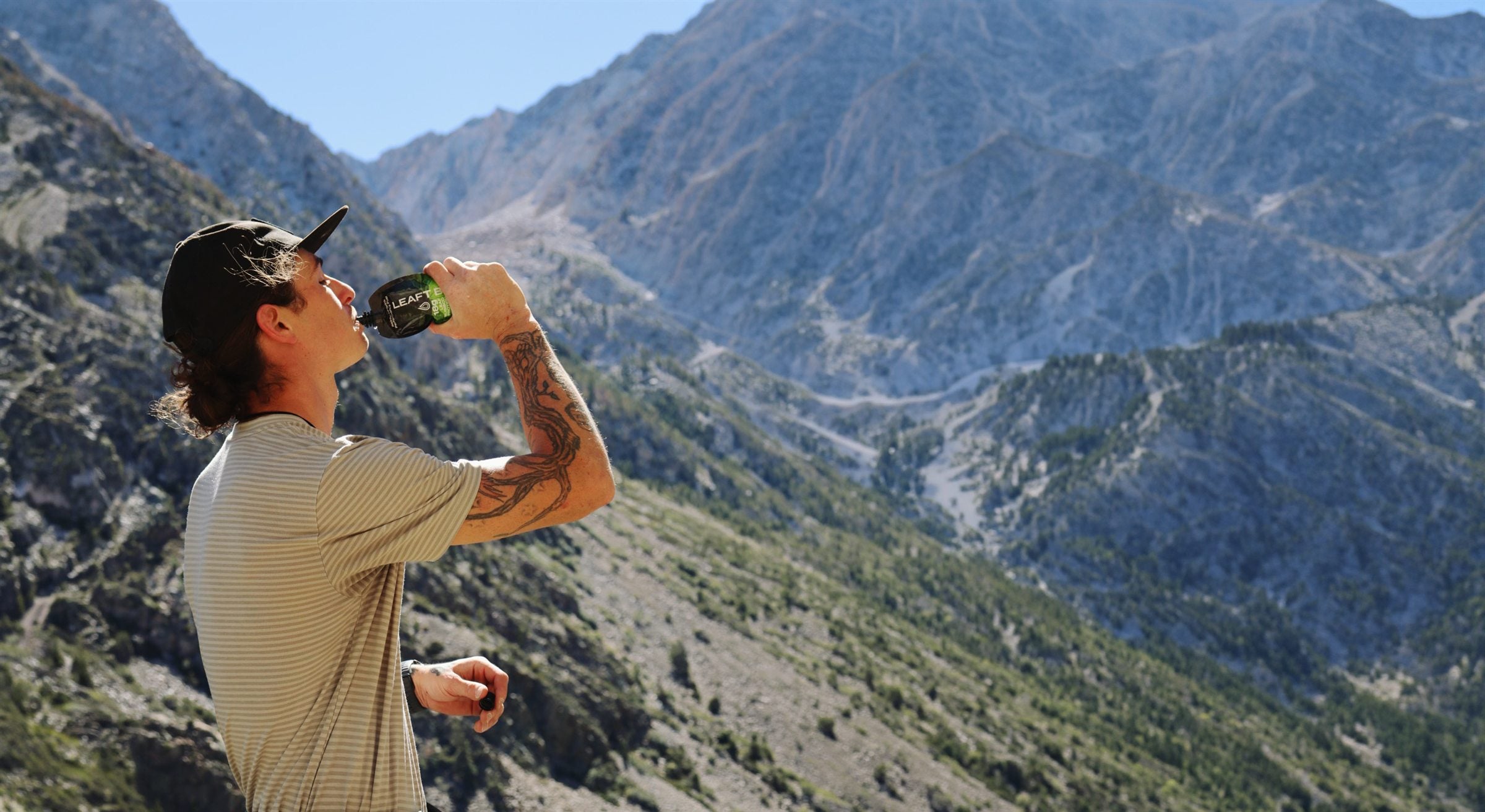 Potter Wonderland drinking a Blade above a mountain valley